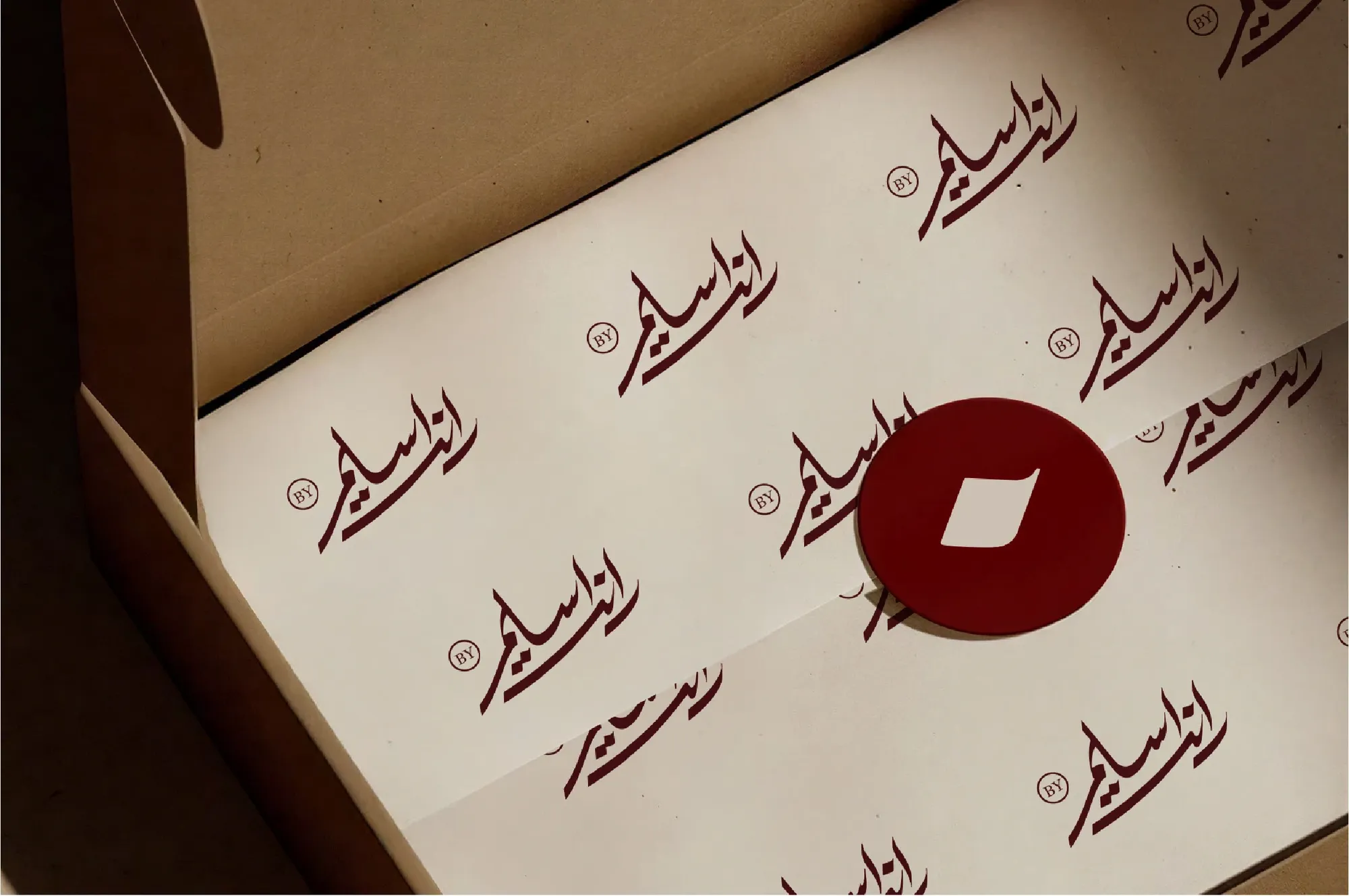 Randa Selim pattern on tissue paper in a box